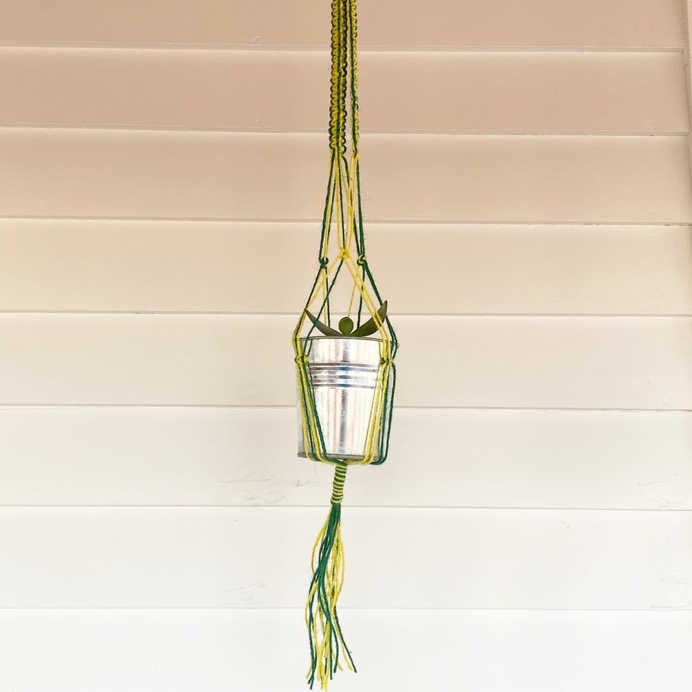 Handmade green and gold macrame plant hanger